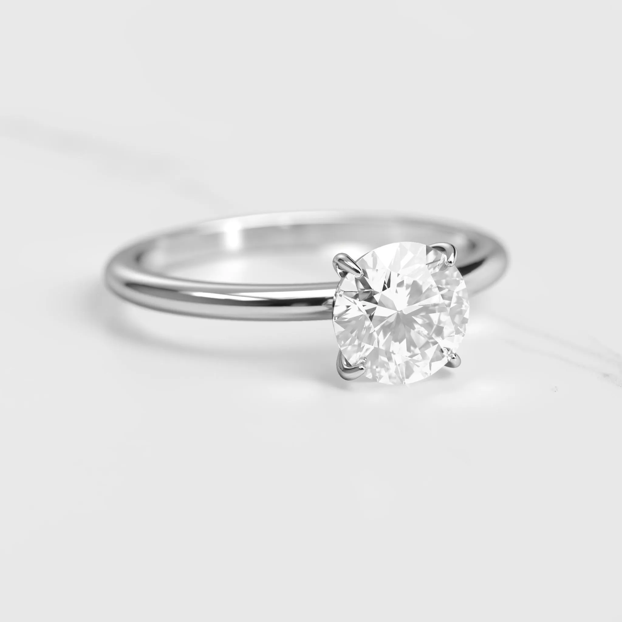 Round Tapered Solitaire Diamond Ring