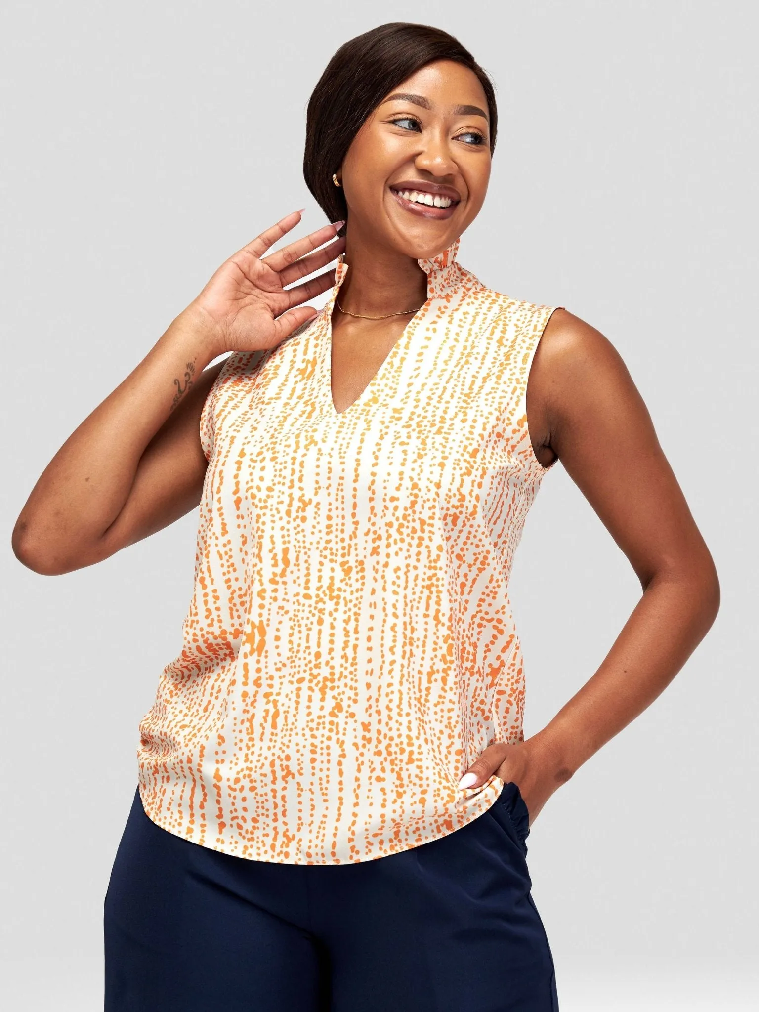 Vivo Sani Sleeveless Ruffle Neck Top - Off White / Orange Heri Abstract Print